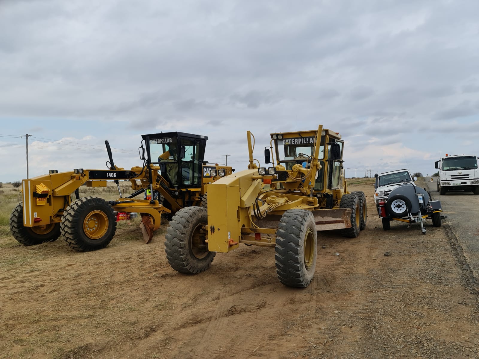 Aurex graders working on a road-works site
