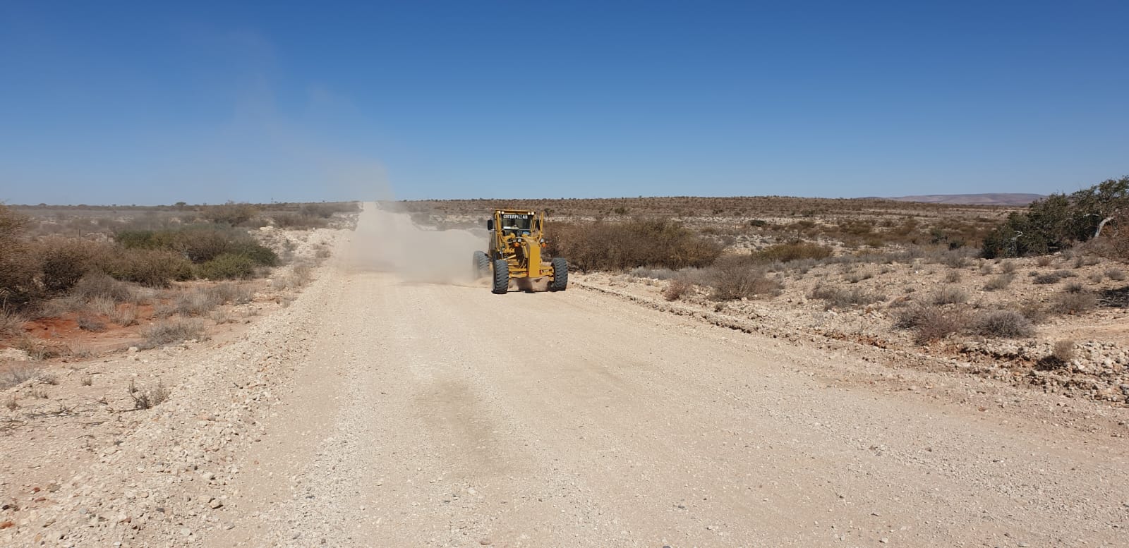 Aurex grading a road on a civil-infrastructure project